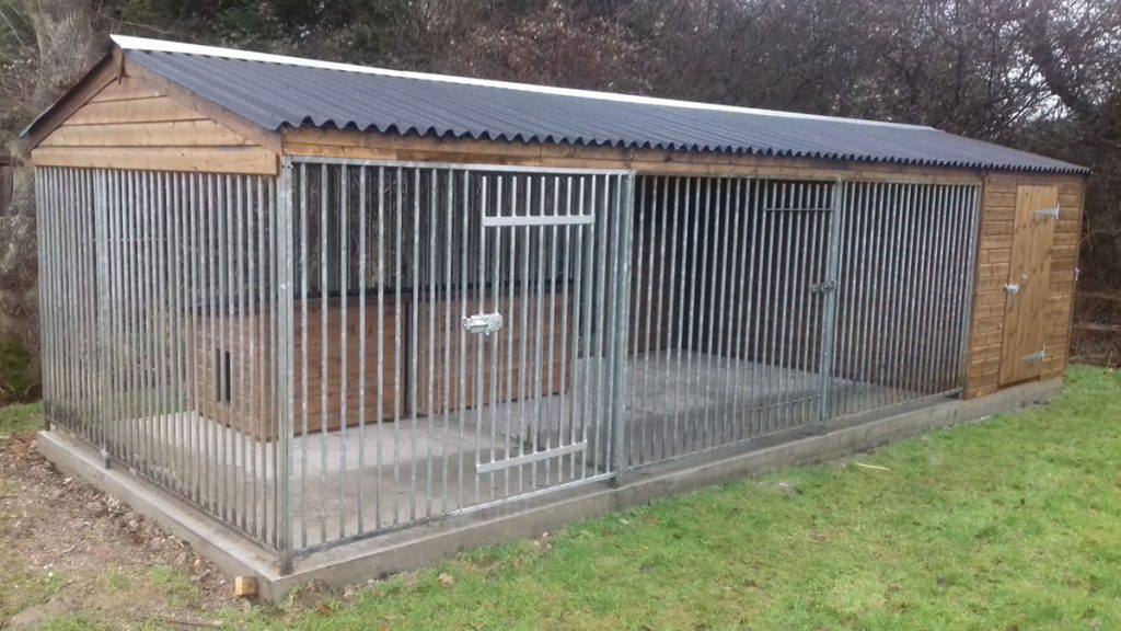 Good size dog run with two individual kennels and a feed store at one